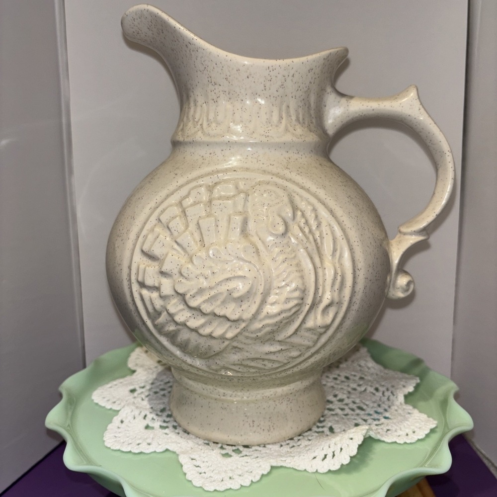 McCoy Embossed Speckled Ivory Turkey Pitcther 9" x 7" x 10"